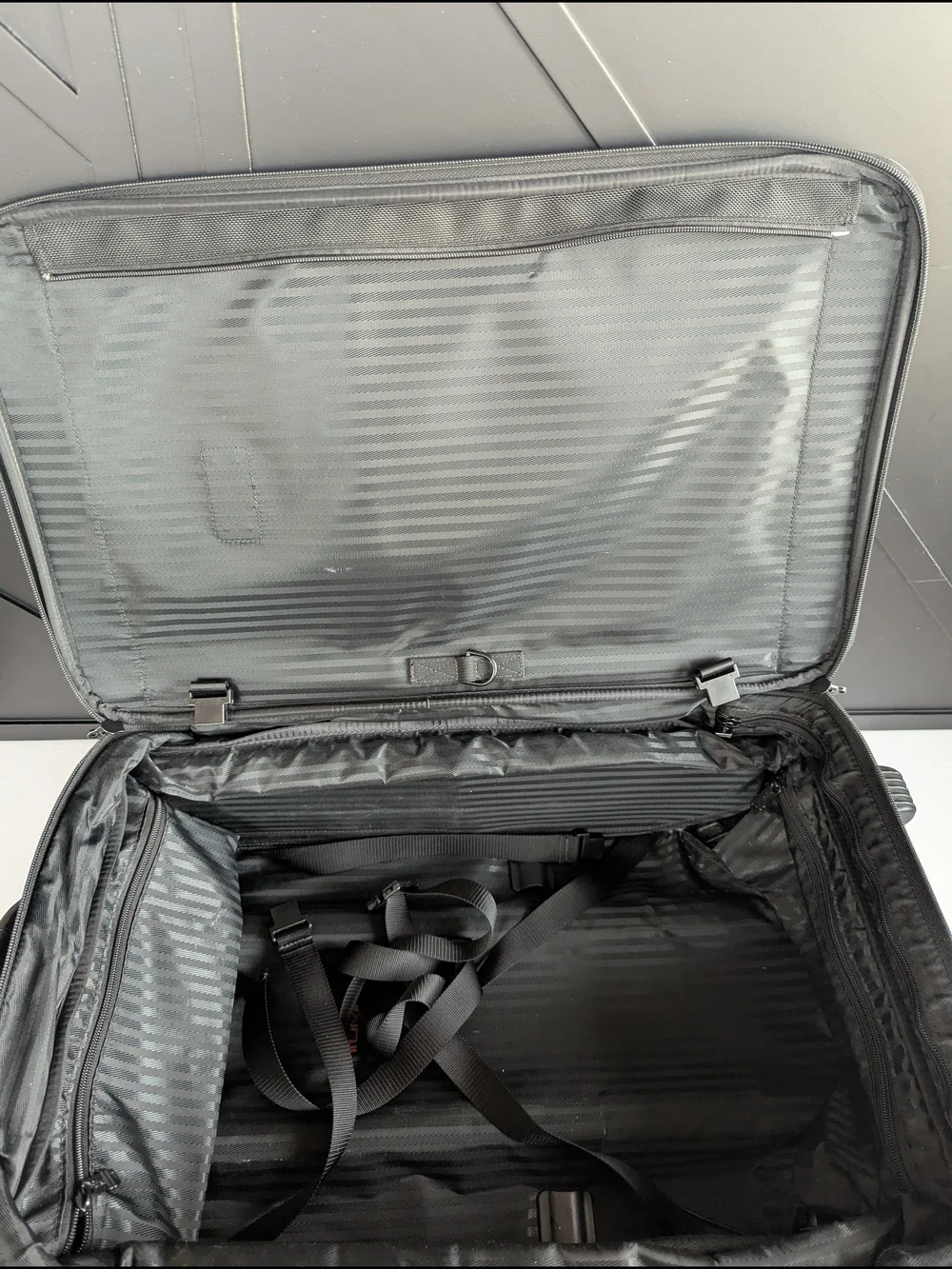 Tumi Black Men’s Carry-On Rolling Travel Bag